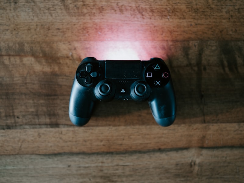 Player reviewing combat footage on multiple screens